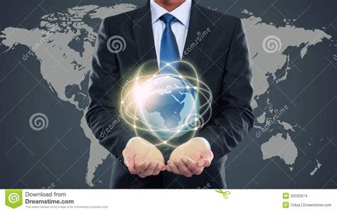 Man holding up the world. Business Man Holding The Small World Of Multimedia Stock ...