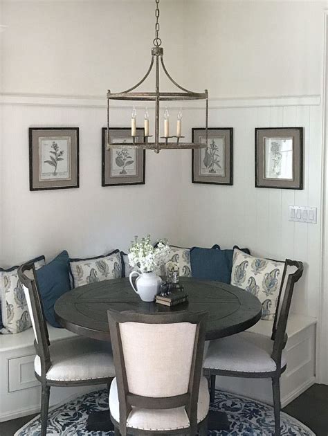 Two chairs include metal frames that support solid wooden seats with backrests. Beautiful Homes of Instagram | Dining room cozy, Dining ...