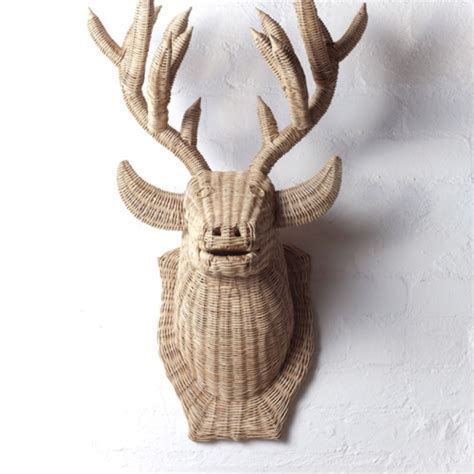 These faux animal heads are sure to attract a crowd's attention and is a wonderful conversation piece. rattan reindeer head | Oh deer | Pinterest