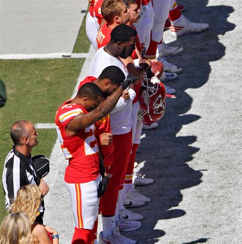 Nfl Players Demonstrate With Raised Fists And Interlocking Arms Maxim