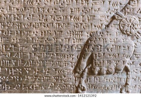 Ancient Assyrian Cuneiform Carved On Stone Stock Photo Edit Now