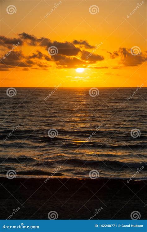A Golden Sunrise With Reflection On The Atlantic Ocean On Delray Beach