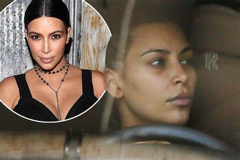 Kim Kardashian Looks Fresh Faced Minus Make Up As She Drives Her Car In