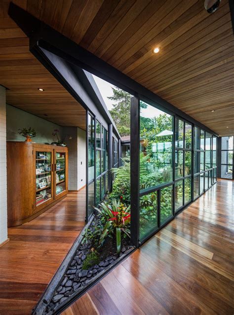 This Triangular Shaped House Makes Room For An Interior Garden Artofit