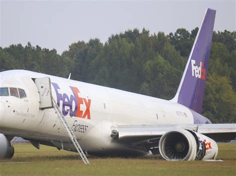 FedEx plane crash-lands at airport after landing gear malfunction