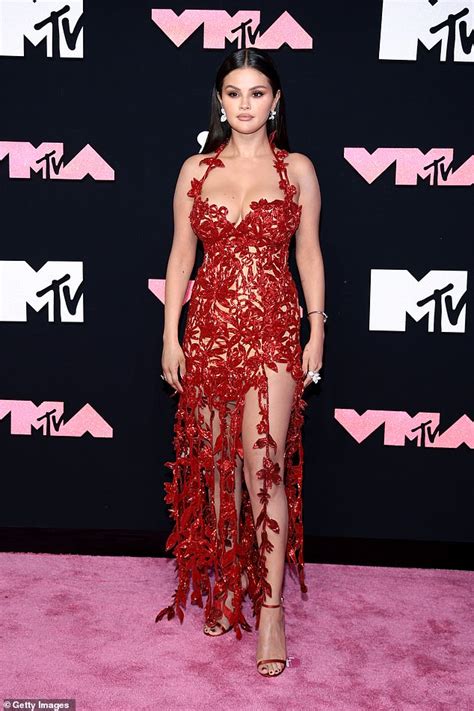 Slaying In Style Selena Gomez Dazzles In A Bold Floral Gown With A