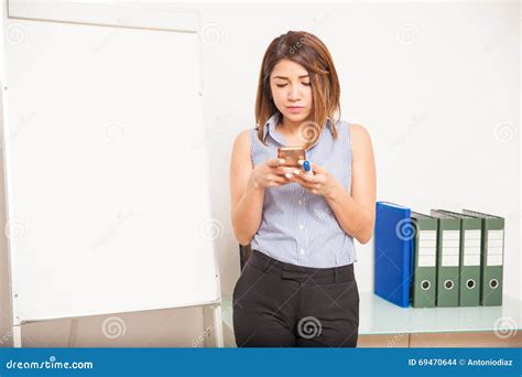 Teacher Using A Smartphone In The Classroom Stock Photo Image Of