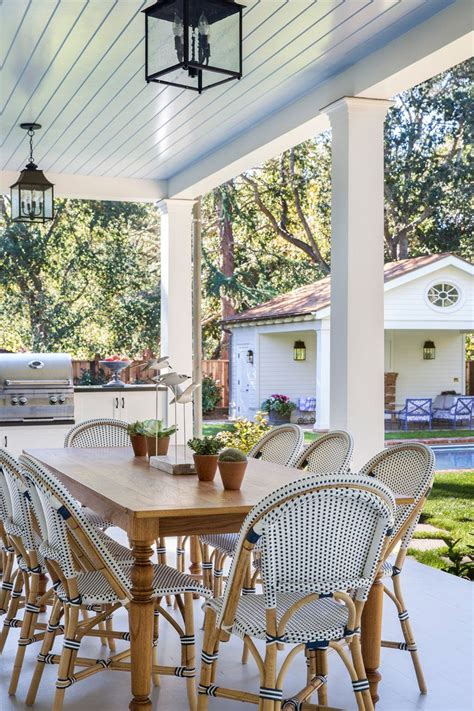 The perfect dining chairs will add a stylish touch to your dining room or living space. outdoor dining on large porch, blue ceiling French bistro ...