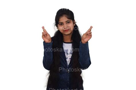 Cute Indian Teenage Girl Fingers Crossed High Resolution Photography