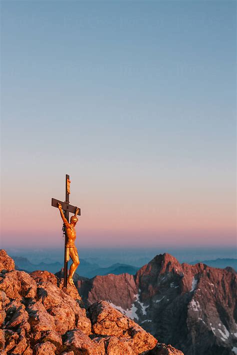 Summit Cross With Jesus Christ On A Mountain Summit At Sunrise By