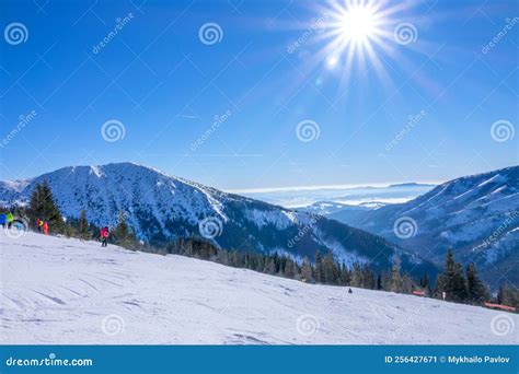Winter Sunny Day Over Mountain Peaks And Ski Slope Stock Image Image