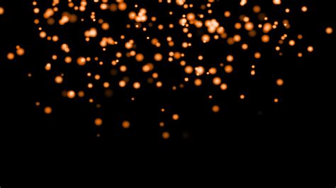 Orange Particles Glowing On The Black Background Black Background With