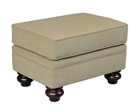 A Small Footstool Sitting On Top Of A Wooden Base