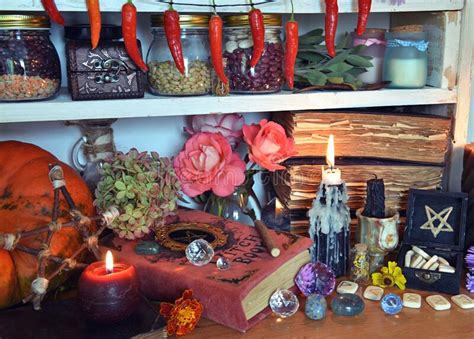 Mystic Still Life With Black Magic Book Candles And Mirrow Stock Photo