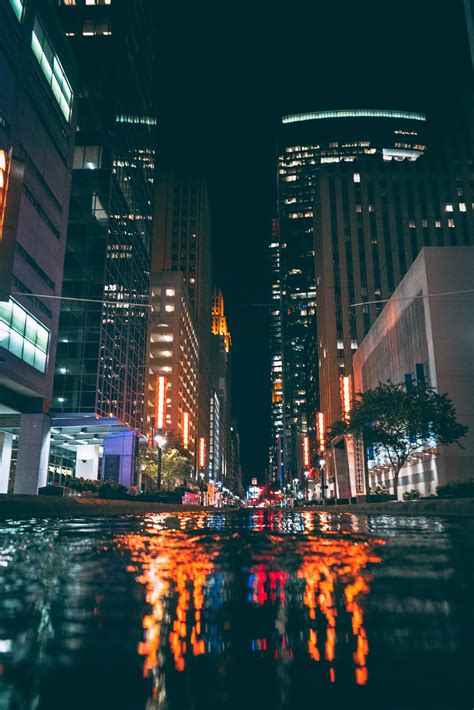 City Buildings During Night Time · Free Stock Photo