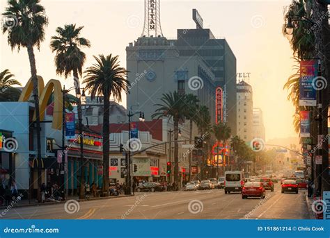 A Beautiful Sunset Shines Down The Famous Hollywood Boulevard Sunset