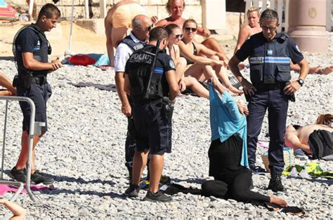 Woman Forced To Strip By Armed Police After Nice Brings In Burkini Ban