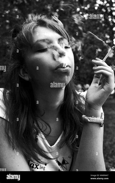 Woman Smoking Cigarette Close Up Black And White Stock Photos And Images