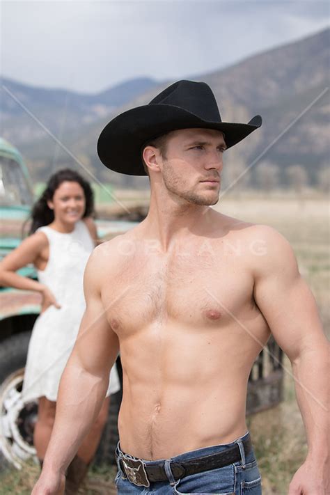 Shirtless Cowboy With A Girl Outdoors Rob Lang Images