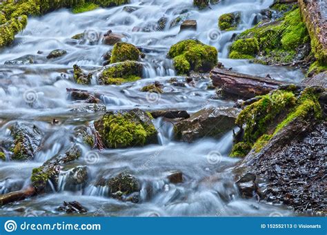 Mossy Rocks With Cascading Waterfall In Forest Stock Image Image Of