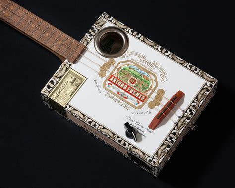 Five and dime tattoo, located at: Five and Dime Cigar Box Guitars on Behance