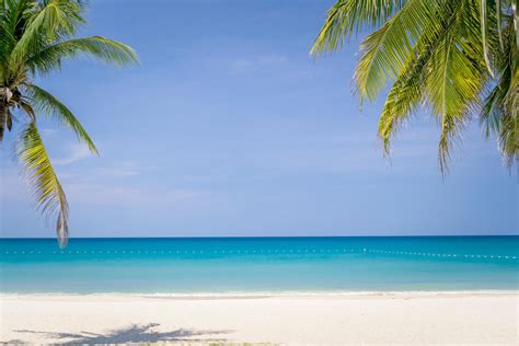 Tropical Beach And Blue Sky Background 2073795 Stock Photo At Vecteezy