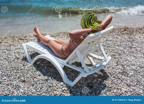 Girl On The White Chaise Lounge On The Beach Stock Photo Image Of