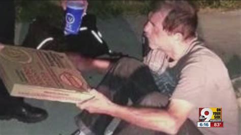 photo of middletown officer giving pizza to homeless man goes viral youtube