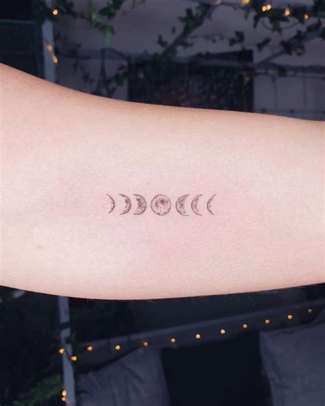 Fine Line Moon Phases Tattoo On The Inner Arm