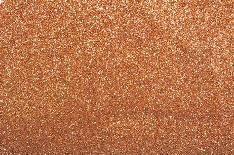 Premium Photo The Texture Of Dry Shiny Glitter Bronze Bright Sparkles
