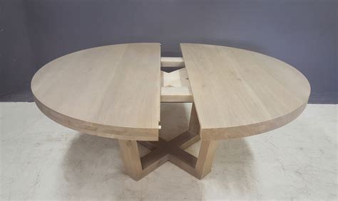 Extendable Aquarius Round Dining Table | Round dining room table, Round wood dining table, Round 