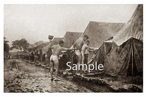 Vintage 1940s Photo Of A Group Of Nude Soldiers Bathing Outdoors In The Rain In Camp Gay