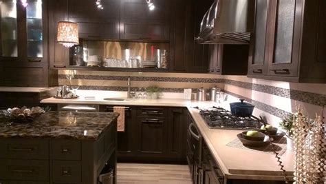 In this case you can see how wall lighting provides some brightness despite the dark color in storage cabinets and counter space. 18 Kitchen Designs Incorporating Dark RTA Cabinets ...