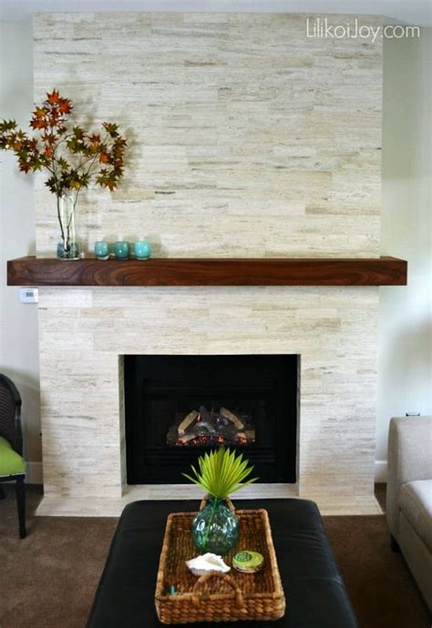 The fireplace was about 60 sq. Family Room Fireplace Makeover with travertine tiles. LOVE ...