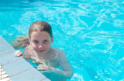 Young Girl In A Swimming Pool By Stocksy Contributor Christina K Stocksy