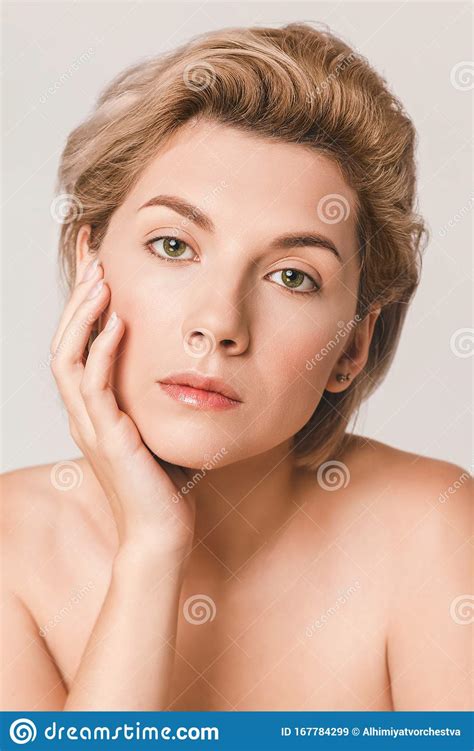 Short Haired Blonde With Green Eyes Looking At The Camera Stock Image Image Of Makeup Eyes