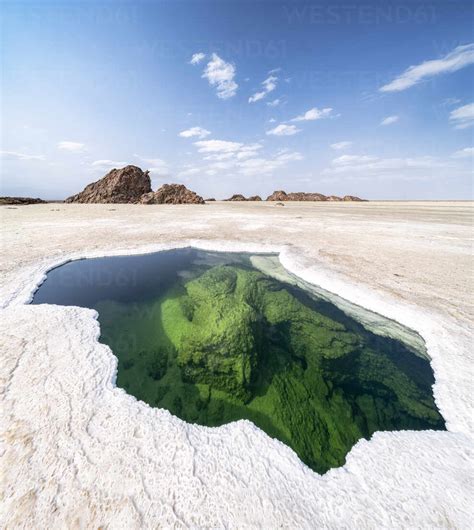 Panoramic Of The Transparent Water Of Natural Pond In The Salt Pan