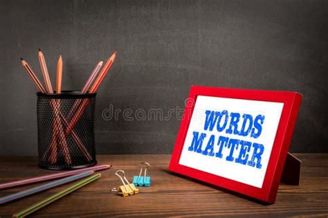 Words Matter Red Picture Frame With Text On Wood Texture Background