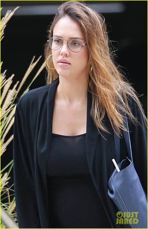 Jessica Alba Shows Off Her Baby Bump While Heading To Work Photo