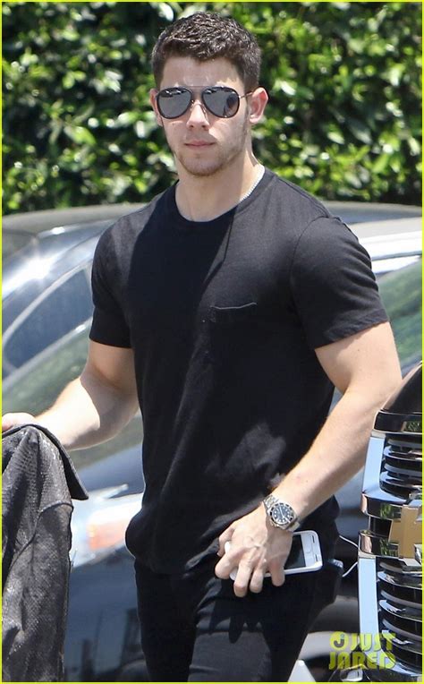 photo nick jonas shows off his buff biceps in a tight t shirt 05 photo 3934167 just jared