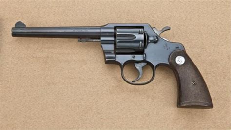 Colt Official Police 38 Special Caliber Double Action Revolver With