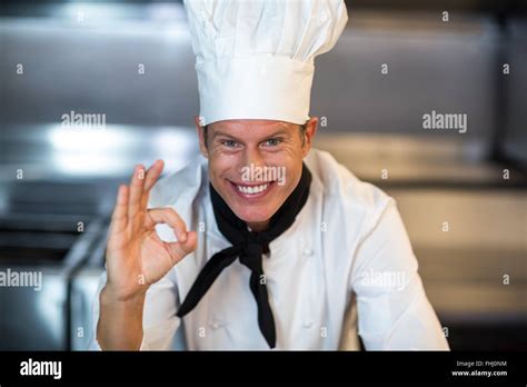 Happy Chef Smiling At Camera Stock Photo Alamy