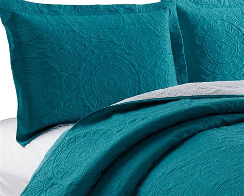 There can be few things better than snuggling under your duvet after a long, hard day at work. Woven Trends Bedding: 3 Piece Madison Quilt Set: Turquoise ...