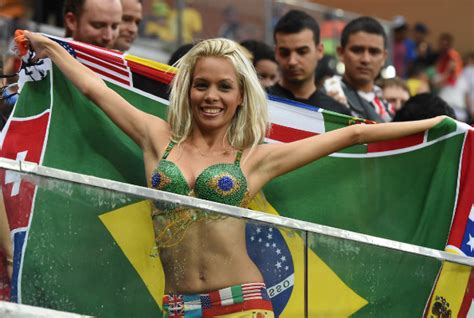 a brazil female soccer fan flauts her body during her national team s go brazil brazil world
