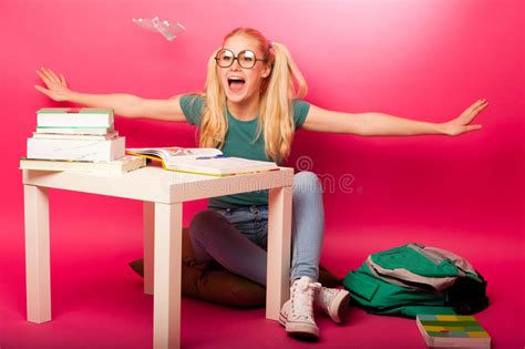 Playful Naughty Schoolgirl With Big Eyeglasses Throwing Paper A Stock