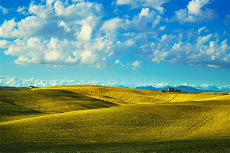 Tuscany Countryside Panorama Rolling Hills And Fields On Sunset Stock