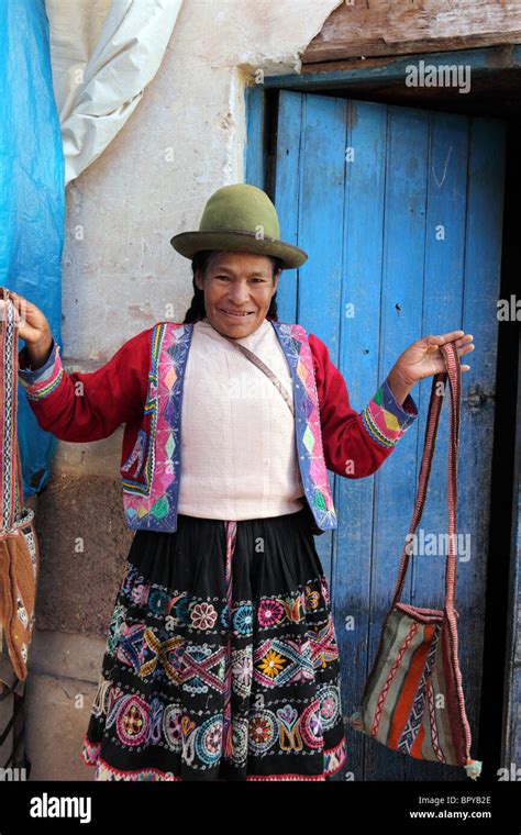 Quechua Lady Selling Bags Outside Her House At Pisac Market Sacred
