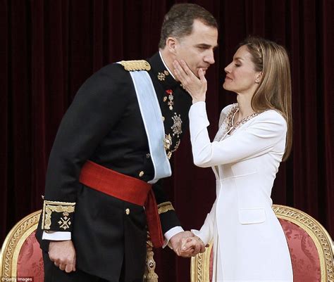 King Felipe Of Spain Kisses New Queen Letizia As He Takes Crown From