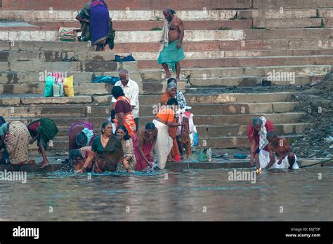 India Varanasi 27 February 2011 Group Of Women Taking A Hindu Ritual Bath In Ganges River