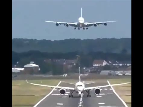Video Viral Video Of Planes Landing And Taking Off Simultaneously On